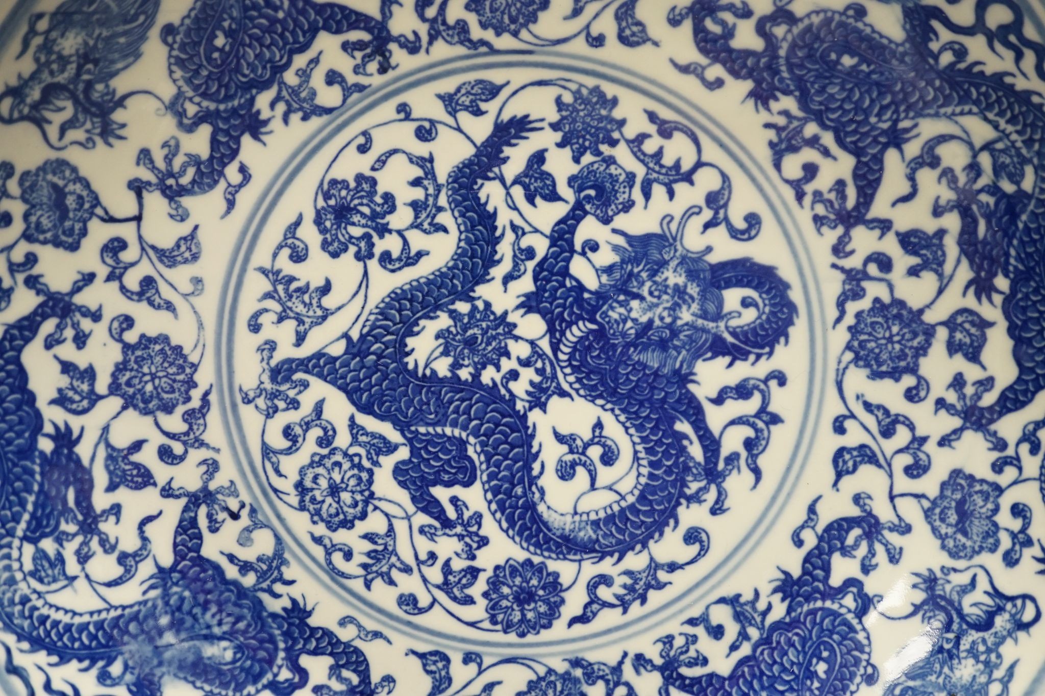 A Chinese blue and white ‘dragon’ dish 31cm